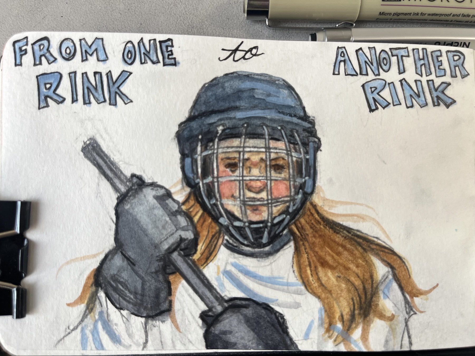 Travel sketchbook portrait of a hockey player in a helmet